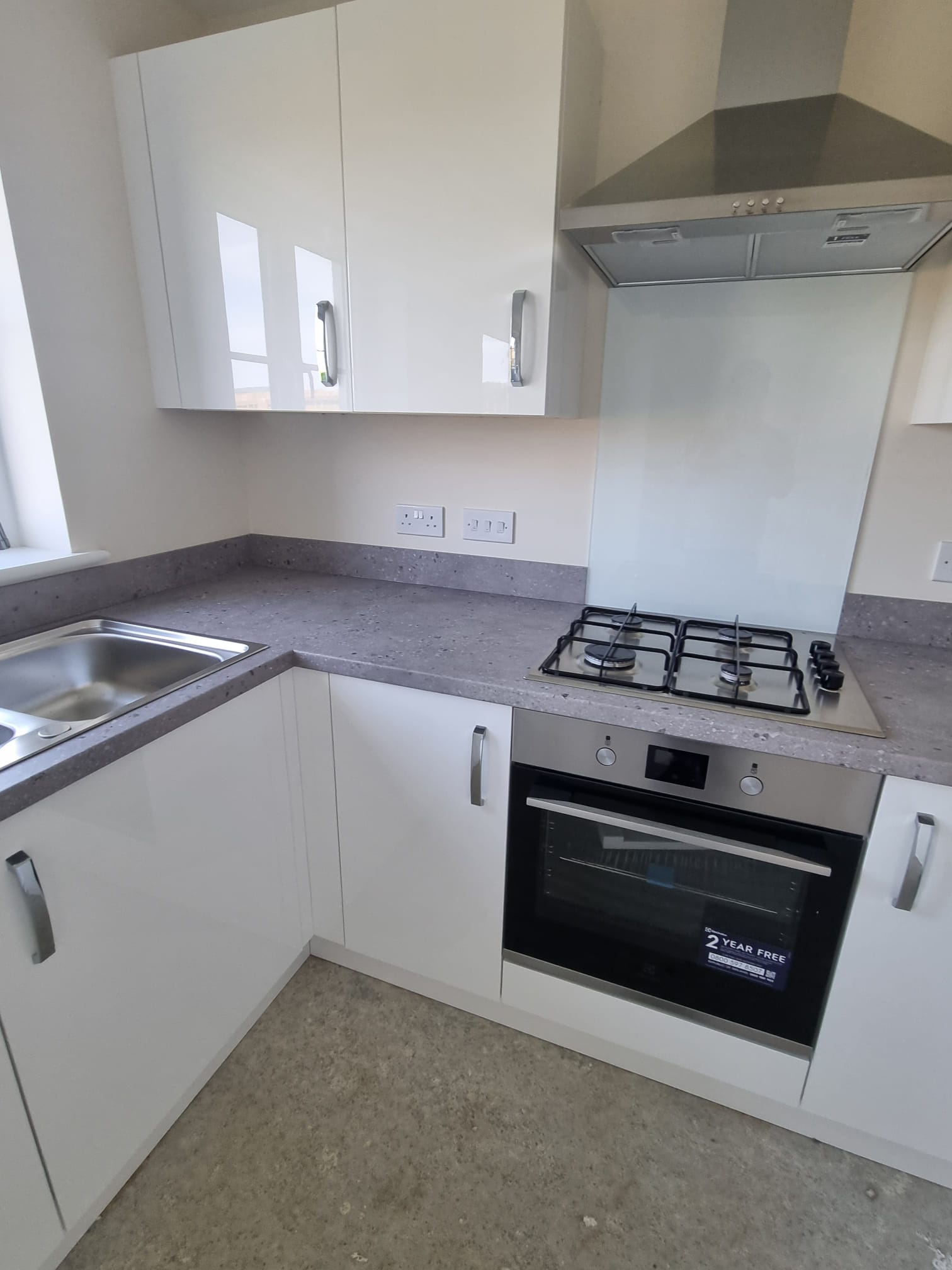 A modern kitchen bathed in soft light