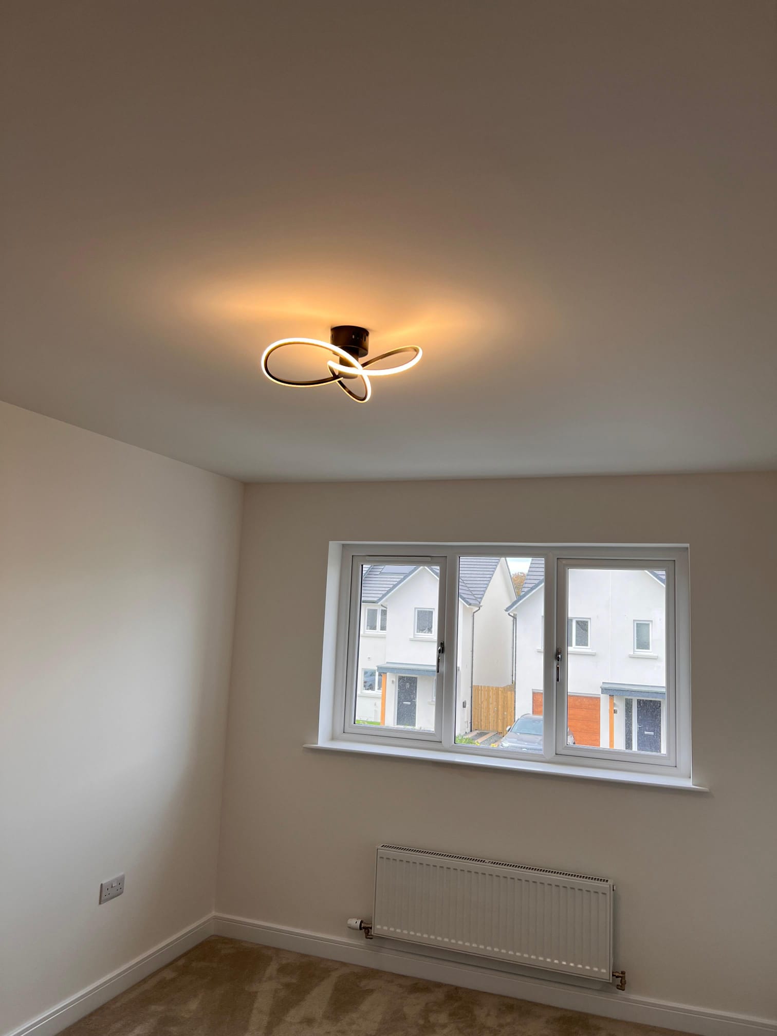 A serene indoor setting, bathed in soft light that filters through a window on the right wall