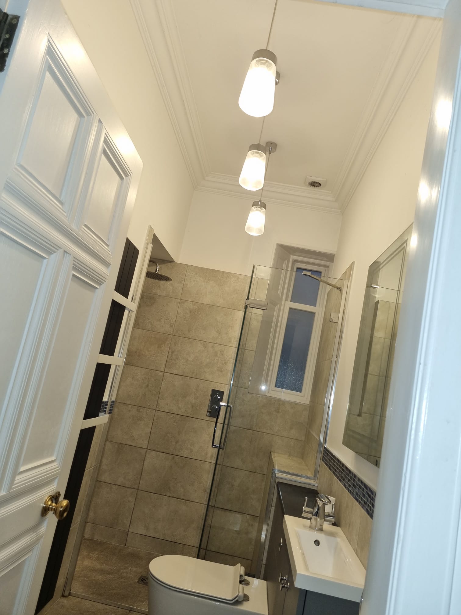 A quaint bathroom bathed in soft light