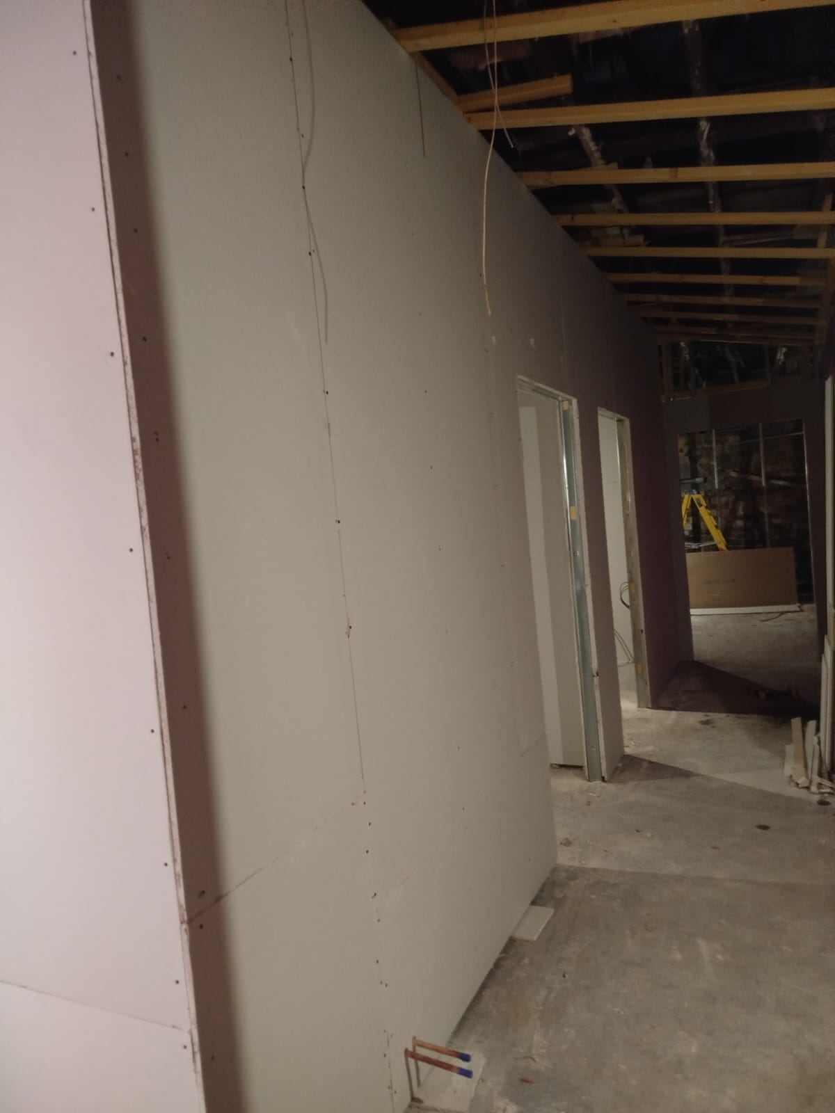 A moment in a construction or renovation process within an indoor space